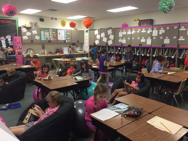 this is an image of students working in a classroom